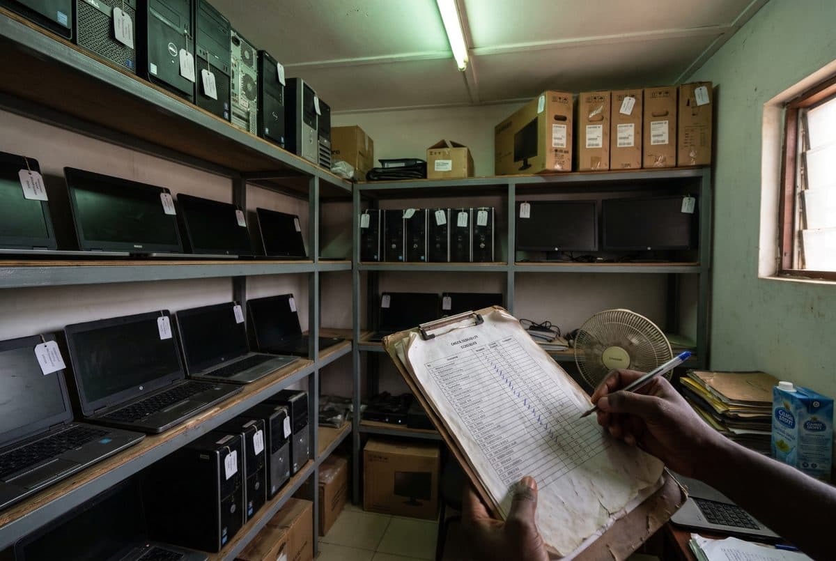 Asset verification check against tagged laptops and desktops in a store room